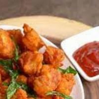 Gobi Manchurian · Gobi Manchurian is made with fried corn flour battered Cauliflower and tossed in soya sauce,...