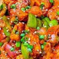 Baby Corn Manchurian · Baby Corn Manchurian is made with fried corn flour battered Baby Corn and tossed in soya sau...