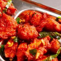 Chicken 65 · Spicy, halal. This dish can set your taste buds on fire. Made with chicken, yogurt and secre...
