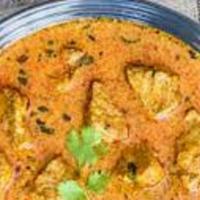 Lamb Korma · In this mild curry lamb is braised in a yogurt, cream, and seasoned with mild aromatic India...