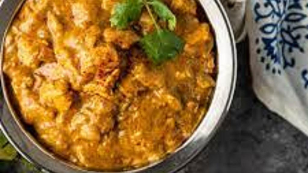 Chicken Korma · In this curry chicken is braised in a yogurt, cream, and seasoned with aromatic Indian spices like cardamom, cumin, cinnamon, and coriander