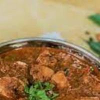 Chicken Chettinadu · Chicken cooked in Onion Gravy with Chetinnadu masala that originated from Tamil Nadu.