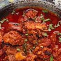 Lamb Vindaloo · lamb meat marinated and cooked in chillies, vinegar, garlic and spices