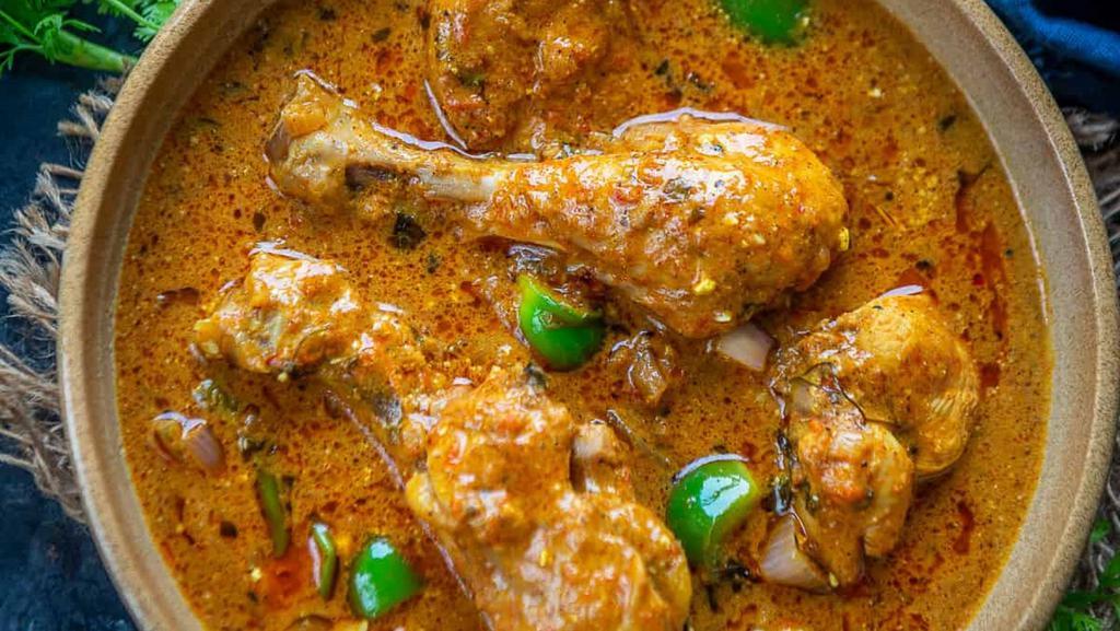 Kadai Chicken · Chicken Cooked in Onion based Gravy with Diced Onion and Bell Pepper.