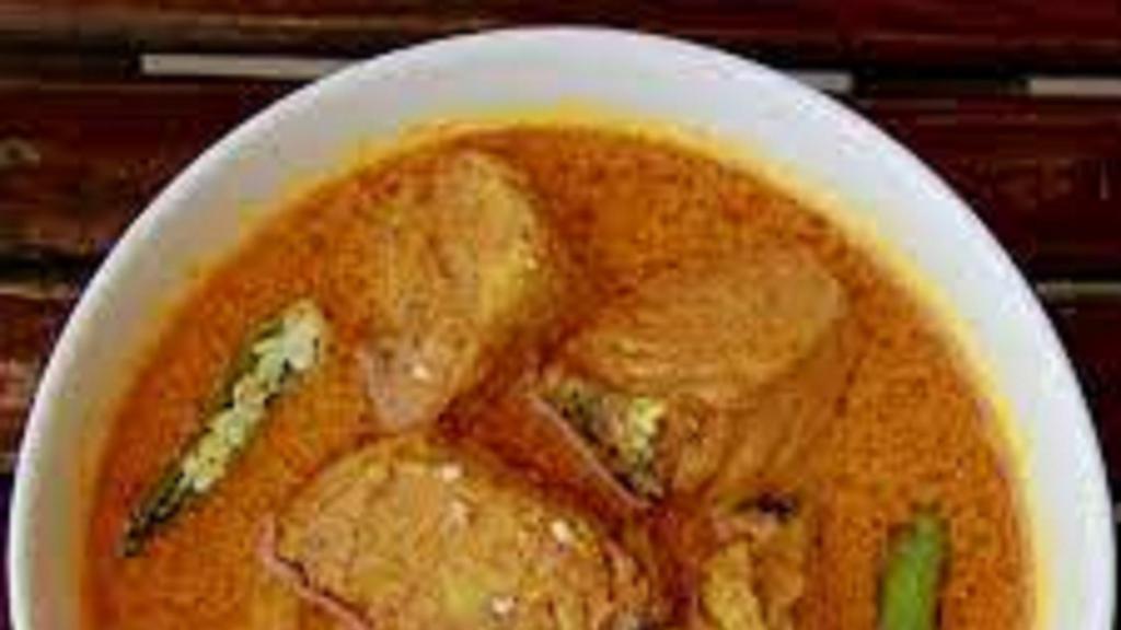 Goan Fish Curry · Fish Fillets cooked in  coconut milk and mustard oil, making them creamy with a bit of a unique spice