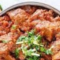 Kadai Lamb · Lamb Cooked in Onion based Gravy with Diced Onion and Bell Pepper.