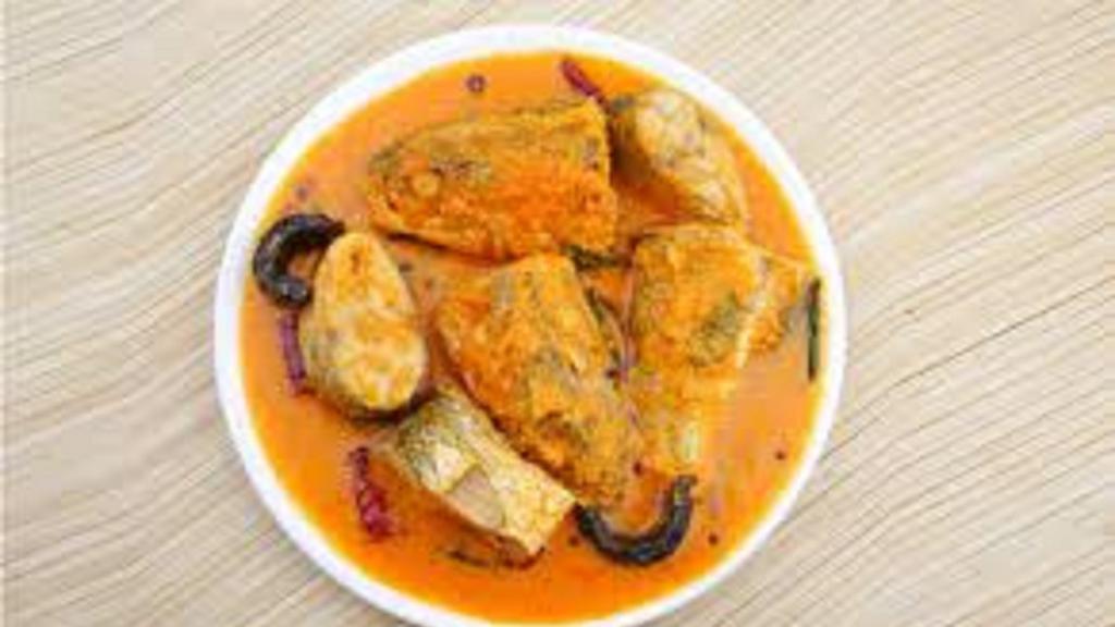 Malabar Fish Curry · Boneless Fish Fillet cooked in Tamarind and Coconut Sauce.