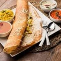 Masala Cheese Dosa · Crepe made with Rice. Stuffed with Potato Filing and Topped with Cheese.  Served with Chutne...