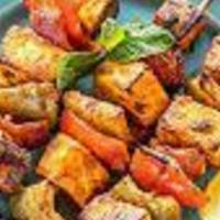 Paneer Tikka Kebab · a delicious appetizer that is packed with flavor. It starts with cottage cheese cubes marina...