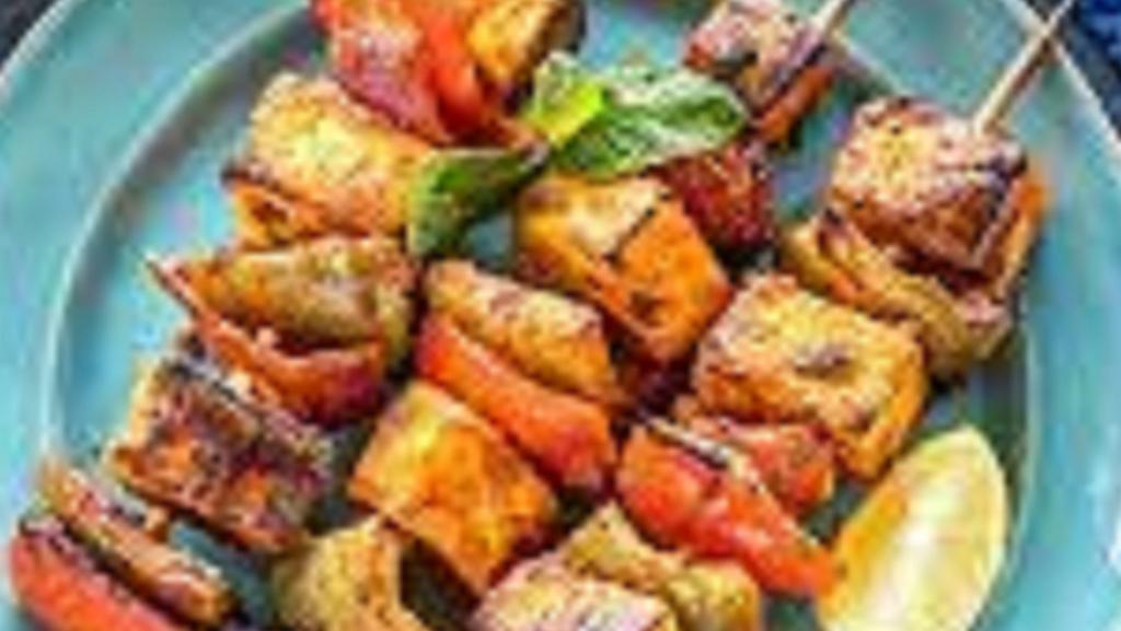 Paneer Tikka Kebab · a delicious appetizer that is packed with flavor. It starts with cottage cheese cubes marinated in yogurt along with lime juice and aromatic spices in a tandoor
