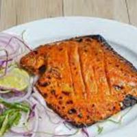 Tandoori Pamfret · Fish marinated with spices and slow cooked in tandoor