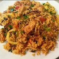 Boneless Chicken Biriyani · Flavored rice cooked with Boneless chicken meat and our secret spices.