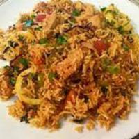 Vegetable Dum Biriyani · a popular spice and vegetables mixed flavored rice dish which is typically prepared by layer...