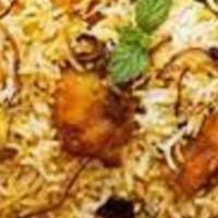 Fish Biriyani · Flavored rice cooked with Boneless  fish, Basmati rice and our secret spices.