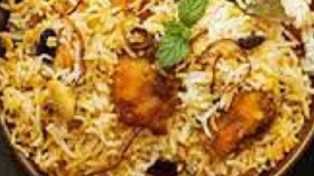 Fish Biriyani · Flavored rice cooked with Boneless  fish, Basmati rice and our secret spices.