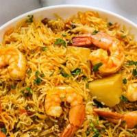Shrimp Biriyani · Flavored rice cooked with Shrimp, Basmati Rice and our secret spices.