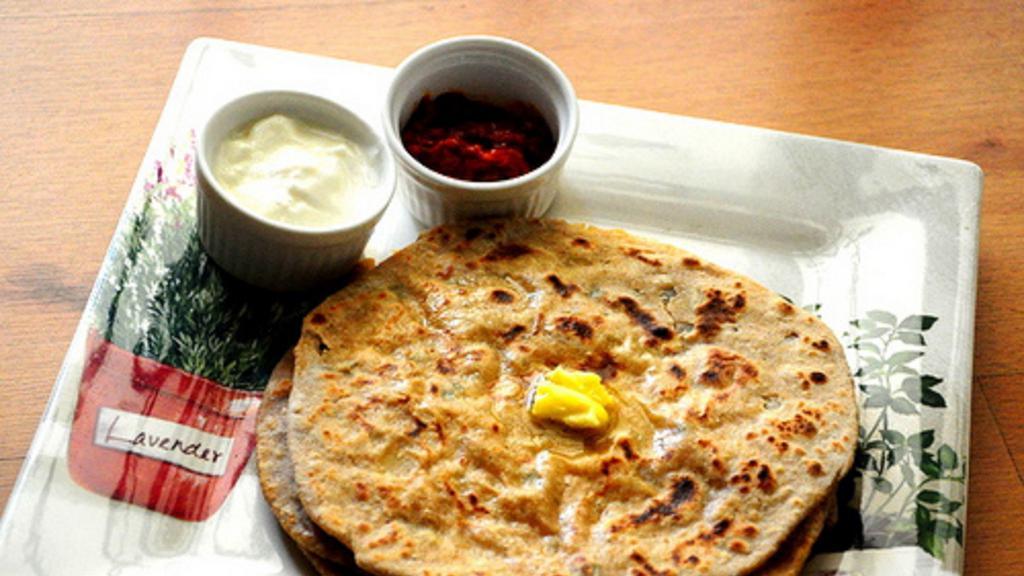 Aloo Paratha · Vegetarian. Bread stuffed with potato