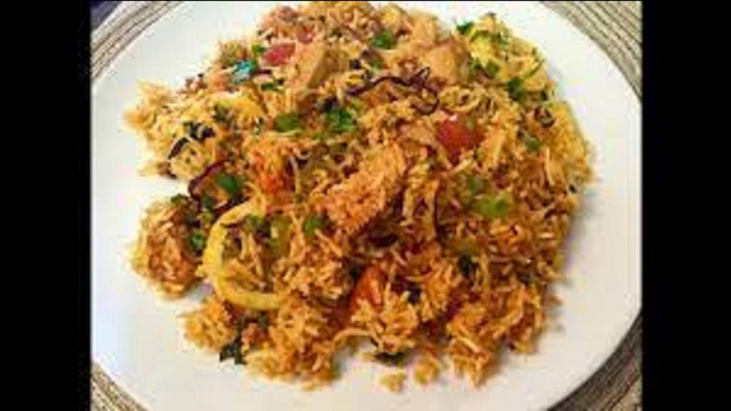 Chicken 65 Biryani Family Pack · Chicken 65 Biryani is a special kind of biryani where the cooked rice is layered with chicken 65 masala and other spices, and dum cooked with perfection.