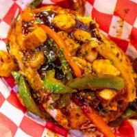 Caribbean Jerk Chicken · Grilled chicken bites sautéed with onion and bell pepper in a jerk sauce.
