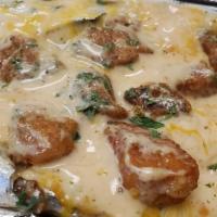 Chicken Alfredo · Grilled or crispy chicken bites, shredded cheese, top with alfredo sauce.