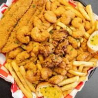 Seafood Platter · Shrimp, fish, oysters, fries, and toast.