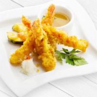 Shrimp Tempura (3) · Shrimp tempura(2) crab meat cucumber seaweed salad with spicy mayo & poke sauce.