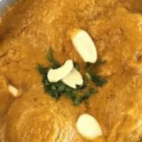 Malai Kofta · Vegetable meatball (No meat!) with a tomato-onion curry sauce. Served with rice.
