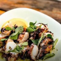 Octopus Grilled On Wood Fire · 