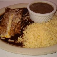 Mole Enchiladas (2) · Mole sauce, with cheese, onion inside and outside, rice and charro beans.