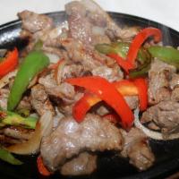 Beef Or Chicken Fajita Plate · Charros beans, rice, green pepper, red pepper, onions, pico de gallo and guacamole (or mix b...