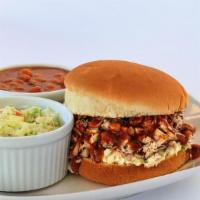 Pork Shoulder Plate · Direct fire smoked pork shoulder, chopped and served with two sides, a toasted bun and our o...