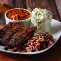 Sampler Plate · Chopped pork shoulder, sliced beef brisket, and 1/4 slab of ribs served with two sides, a to...