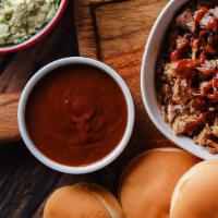 Sandwich Packs · Direct fire chopped pork or beef brisket with enough BBQ sauce, slaw, and buns for up to 6, ...