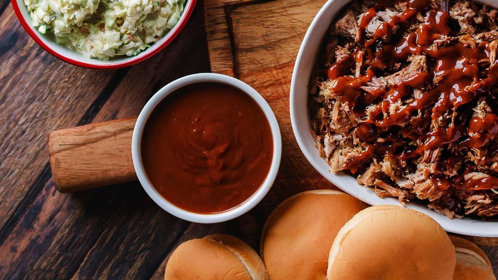 Sandwich Packs · Direct fire chopped pork or beef brisket with enough BBQ sauce, slaw, and buns for up to 6, 12 or 24 people.