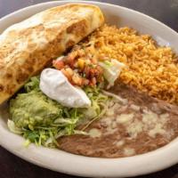 Fajita Quesadilla A La Cart · New item. Quesadilla with Steak or Grilled Chicken sautéed with onions, tomatoes, and bell p...