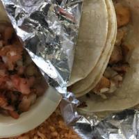 Taco Fish Or Shrimp · Three (3) corn tortillas with your choice of grilled tilapia or shrimp. Served with rice, pi...
