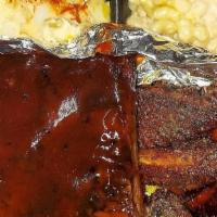Rib/Wing Combo Plate · Ribs & 6pc wings pick your flavor  with choice of three sides