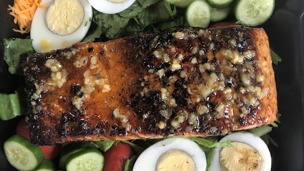 Grilled Salmon Salad · Grilled salmon filet on top fresh bed of romaine lettuce, tomato, cucumbers, croutons and your choice of Italian, balsamic vinaigrette, or ranch dressing.