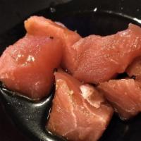 Tuna Martini · Raw. Tuna cubes, scallions and masago and chef sauce.

Consuming raw or undercooked meats, p...