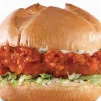 Hot Bird Chicken Sandwich · Our classic fried chicken sandwich dipped on our signature mild sauce topped with lettuce, t...