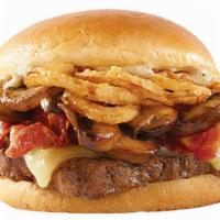 Grilled Mushroom Bacon Burger · Sautéed mushrooms, grilled onions, Swiss cheese, and three thick slices of applewood bacon o...