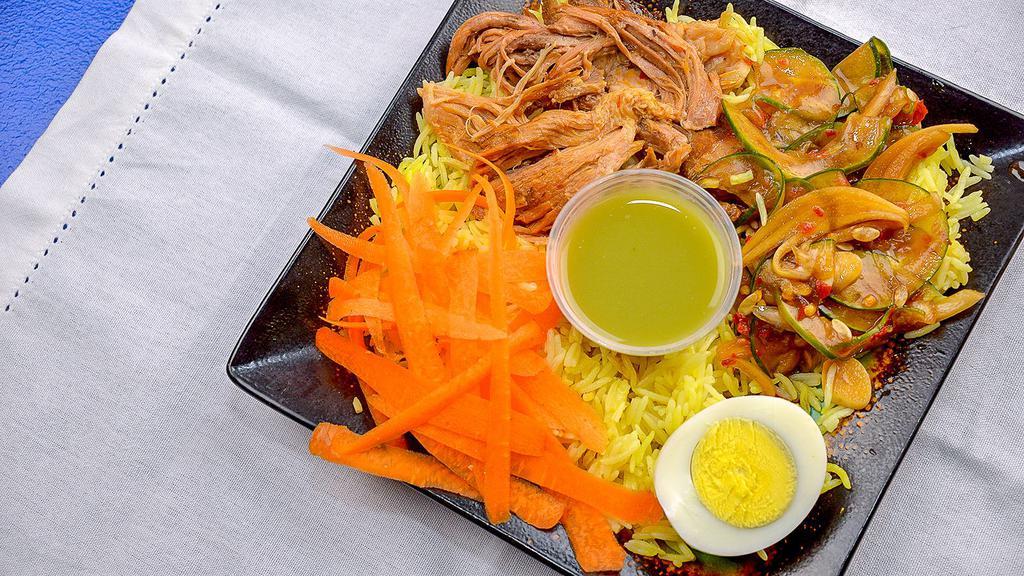 Savory Pulled Pork Rice Bowls · Pulled pork that has been roasted in LIK's savory red sauce.