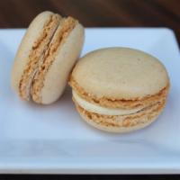 Vanilla Macaron · Vanilla bean flavor cookie sandwiches filled with sweet vanilla cream.
