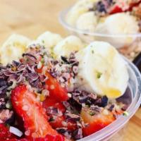 Nutty Bowl · Acai blend topped with granola, banana, strawberries, peanut butter, hemp seeds, cacao nibs,...
