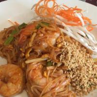 L-Pad Thai  · The most popular dish of Thailand, thin rice noodles pan seared with shrimp, egg scallion, g...