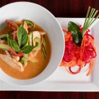 Red Curry · Our popular curry dish, red curry mixed with kaffir lime leaves, bell peppers, zucchini, and...