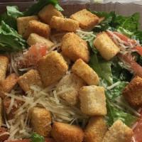 Caesar Salad · Romaine lettuce, tomatoes, croutons and Parmesan cheese.