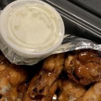 Chicken Wings (40 Wings) · Never frozen, non-breaded wings. Baked half way in store, and deep fried to a delicious cris...