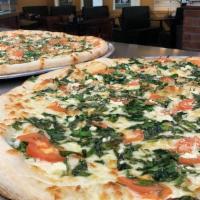 Alfredo'S Gourmet White Pizza · Mozzarella and feta cheeses, spinach, Roma tomatoes, fresh basil and olive oil.