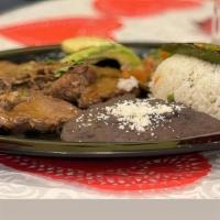 Carne Asada · 10 oz. beef, rice, pico de gallo, refried beans, avocado, and a slice of fried jalepeno